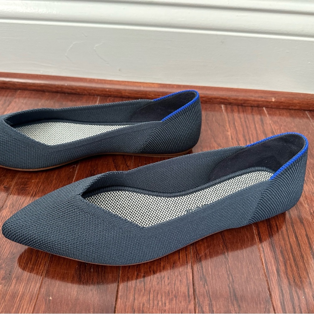 Rothy’s The Point flat navy shoe size 7 women’s, new in box. Machine washable.